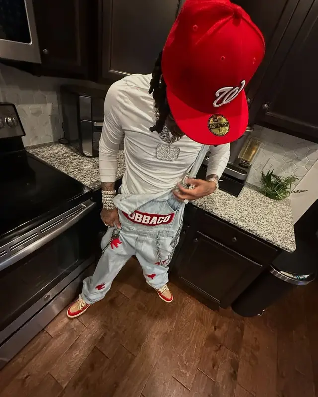 Lil Migo outfit in Pubbaco, Reves Paris, and New Era, 2025