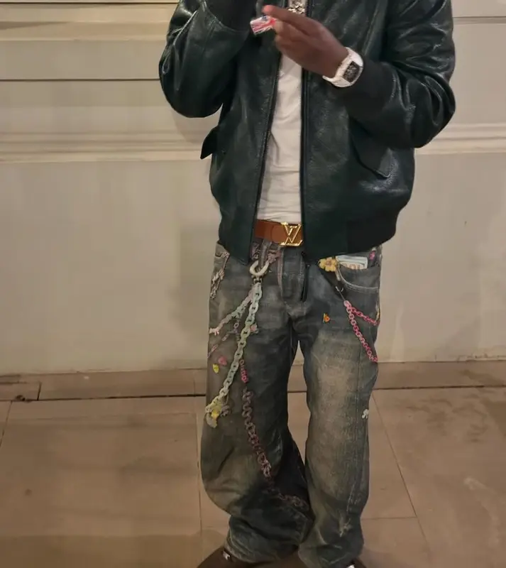 Lil Tjay outfit in Loewe, Louis Vuitton, and Richard Mille, 2025