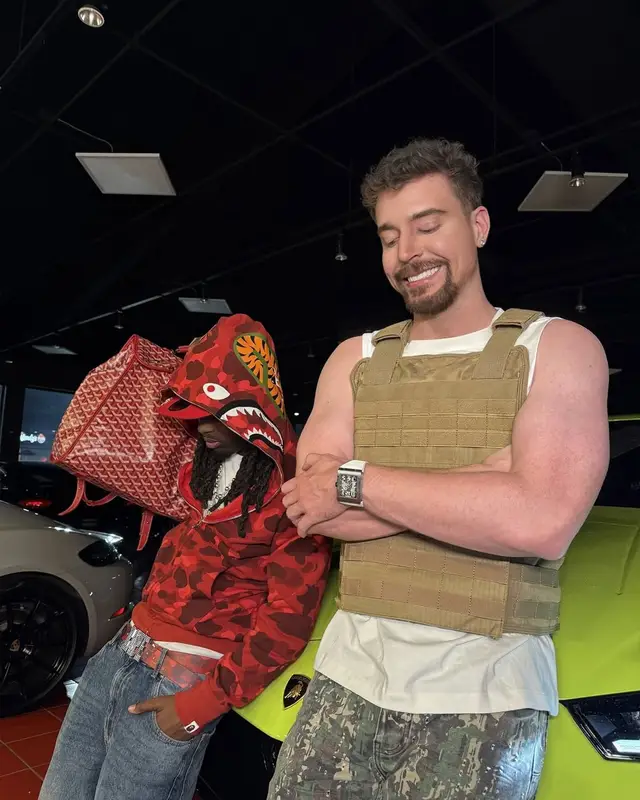 MrBeast outfit in Purple Brand, Richard Mille, and Versace, 2025
