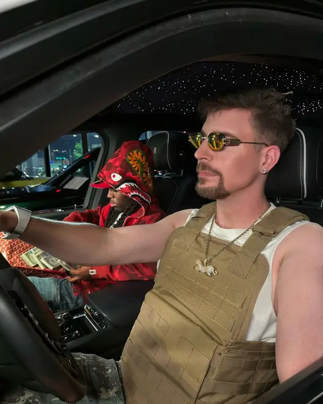 MrBeast outfit in Purple Brand, Richard Mille, and Versace, 2025