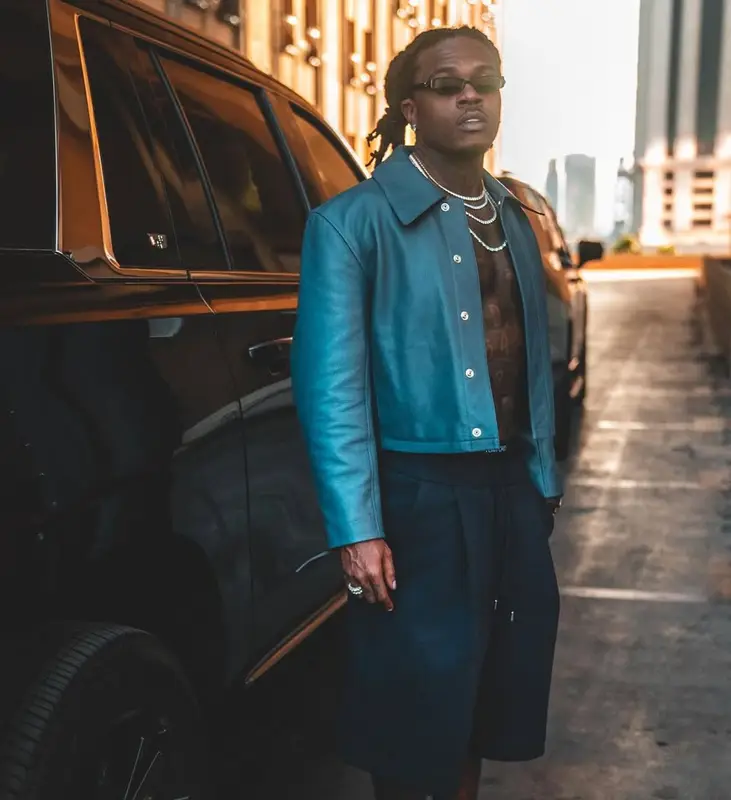 Gunna outfit in Lemaire, Prada, and Tom Ford, 2025