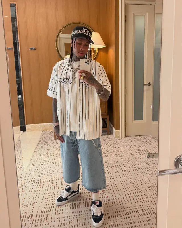 Tyga outfit in Supreme, Marithe + Francois Girbaud, and Hanes, 2025
