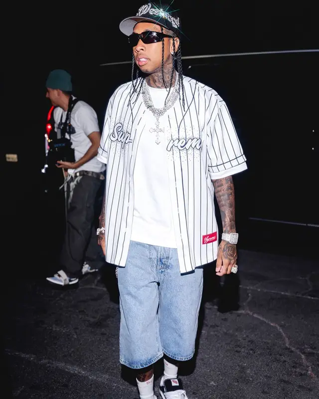 Tyga outfit in Supreme, Marithe + Francois Girbaud, and Hanes, 2025