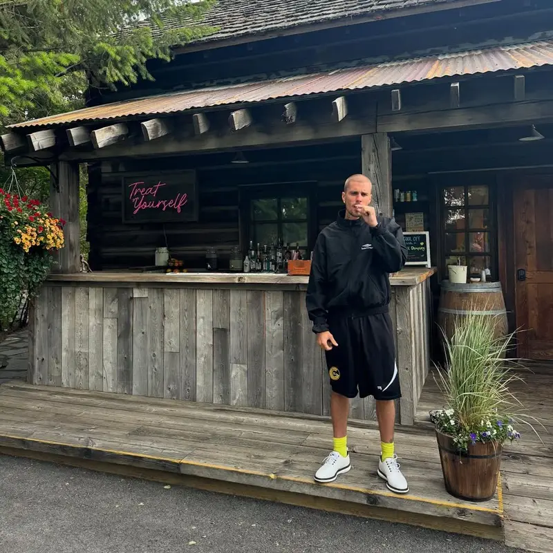 Justin Bieber outfit in Balenciaga, Malbon Golf, and FootJoy, 2025