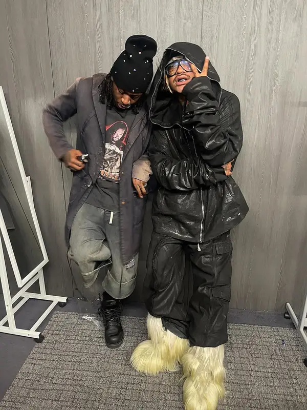Lil Tracy outfit in Rick Owens, Moncler, and Tom Ford, 2025
