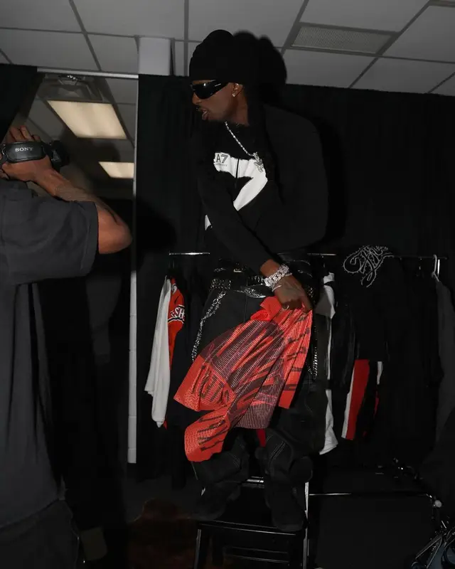 Playboi Carti outfit in Emporio Armani, Chrome Hearts, and Saint Laurent, 2025