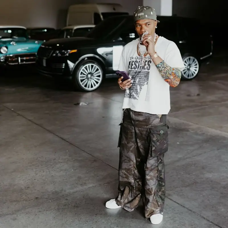 Lil Baby outfit in Adidas, Audemars Piguet, and 64013 Hat, 2025