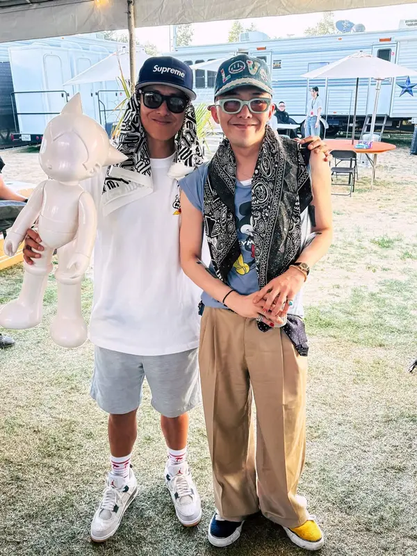G-Dragon outfit in Polo Ralph Lauren, Maison Mihara Yasuhiro, and Jacques Marie Mage, 2025