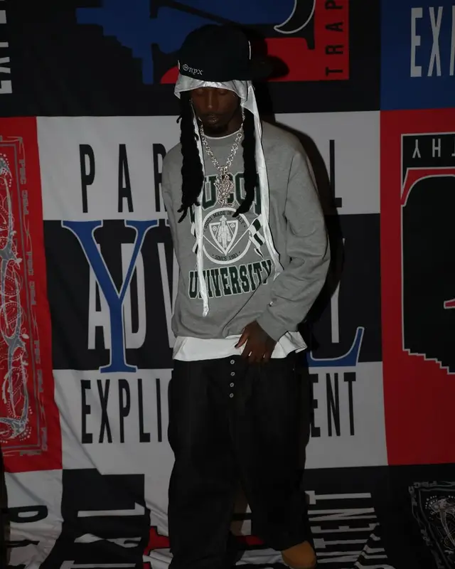Playboi Carti outfit in Gucci, Timberland, and New Era, 2025