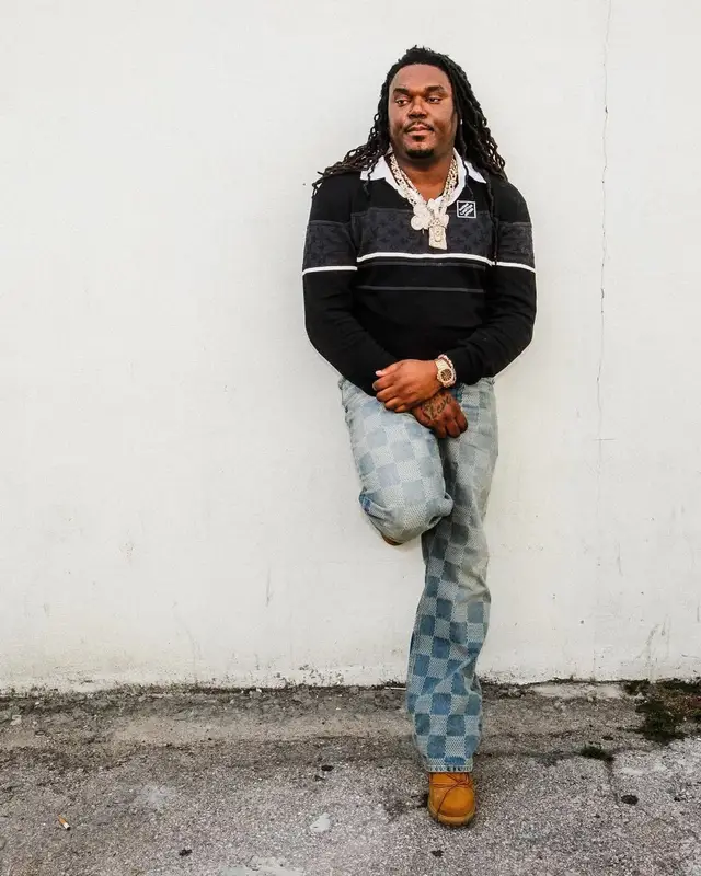 Lucki outfit in Louis Vuitton, Timberland, and Patek Philippe, 2025