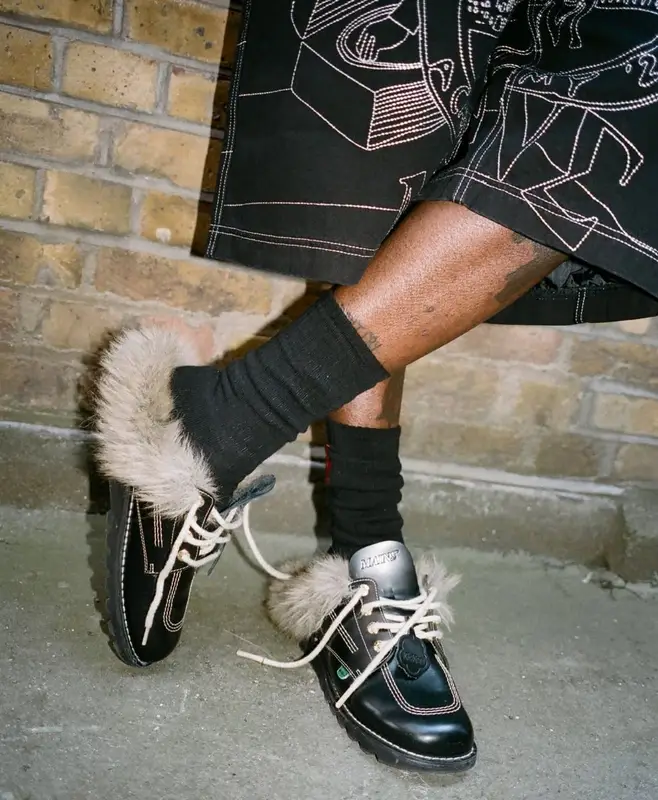 Skepta outfit in New Era, Mains, and Kickers, 2025