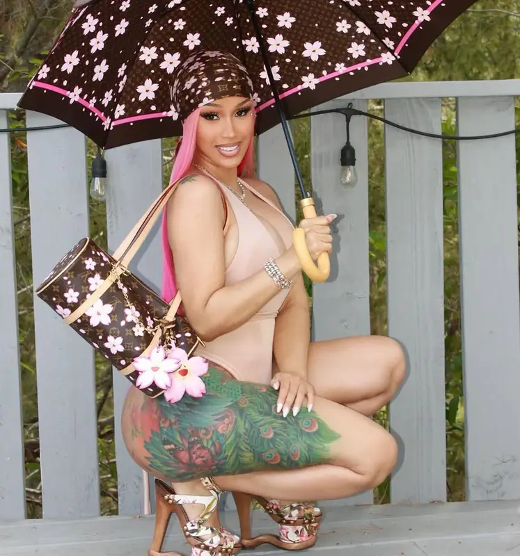 Cardi B outfit in Louis Vuitton, Takashi Murakami, and Skims, 2025