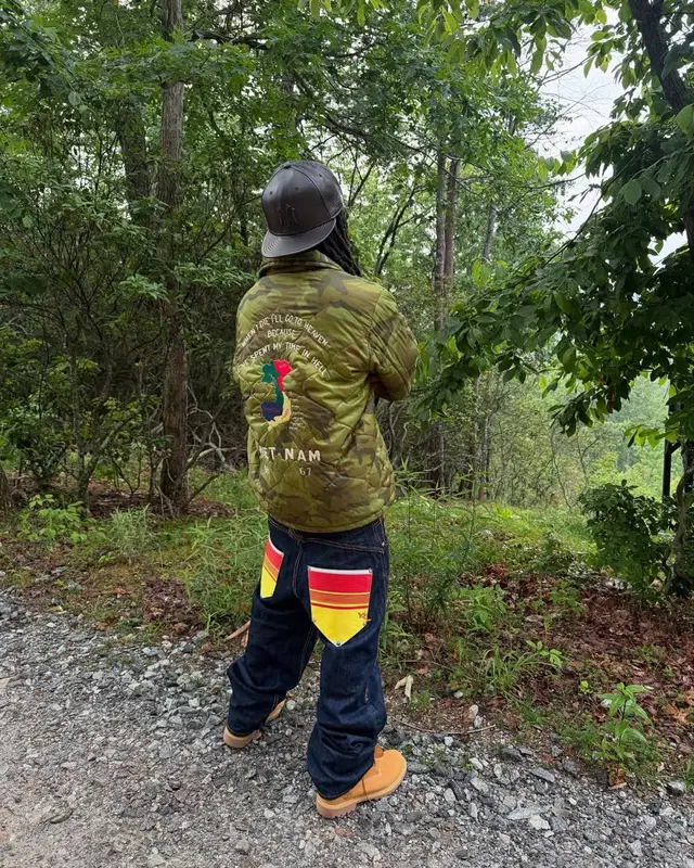 Kai Cenat outfit in Vintage, Louis Vuitton, and New Era, 2025