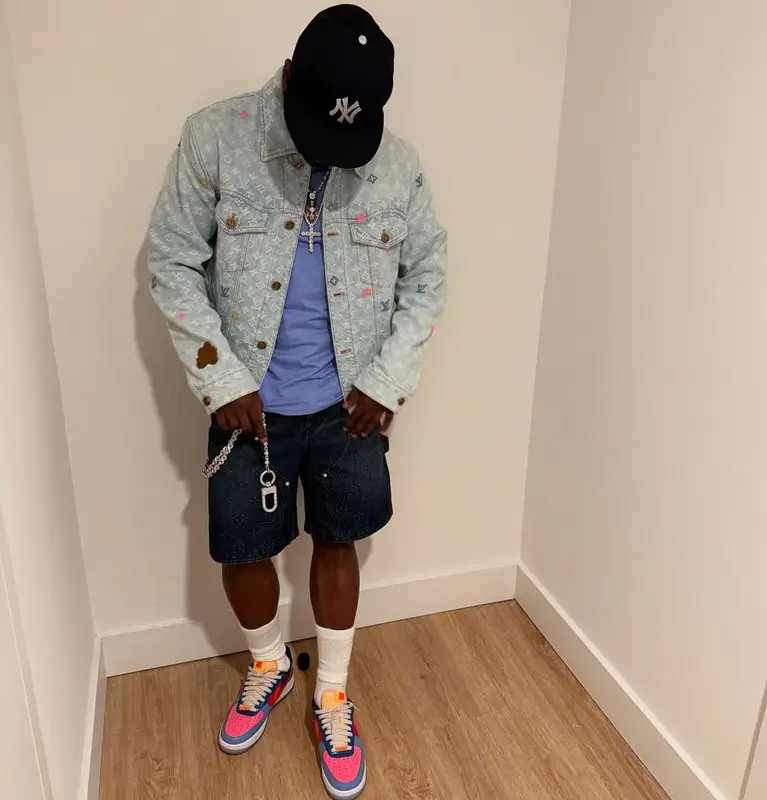 Floyd Mayweather outfit in Louis Vuitton, Nike, and Undefeated, 2025