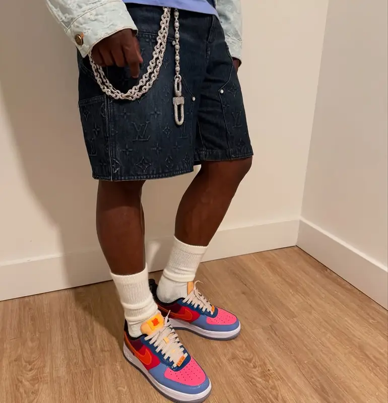 Floyd Mayweather outfit in Louis Vuitton, Nike, and Undefeated, 2025