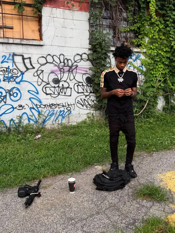 Lazer Dim 700 outfit in Gucci, Purple Brand, and Nike, 2025