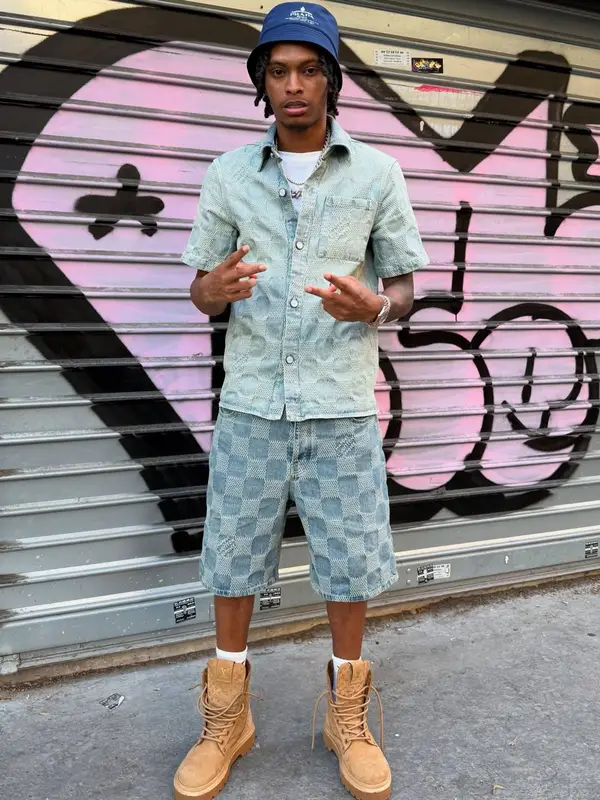 Nemzzz outfit in Louis Vuitton, Prada, and Nike, 2025