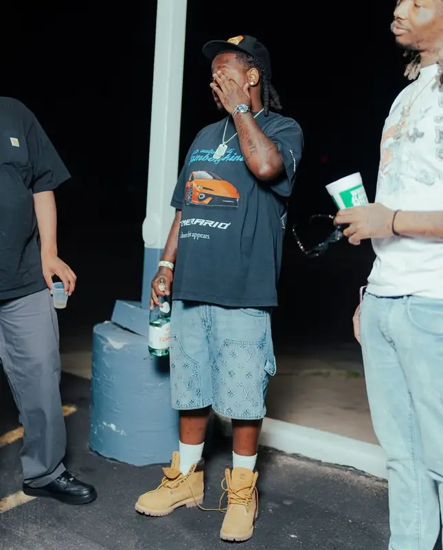 Babyface Ray outfit in Balenciaga, Louis Vuitton, and Lamborghini, 2025
