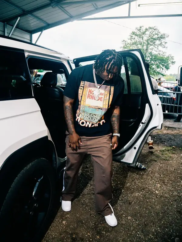 Fredo Bang outfit in Rhude, Nike, and Audemars Piguet, 2025