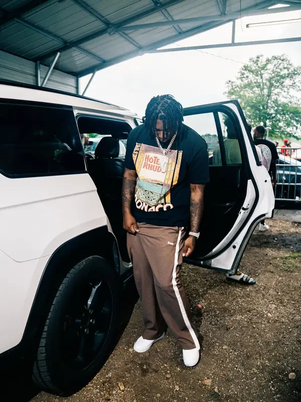 Fredo Bang outfit in Rhude, Nike, and Audemars Piguet, 2025