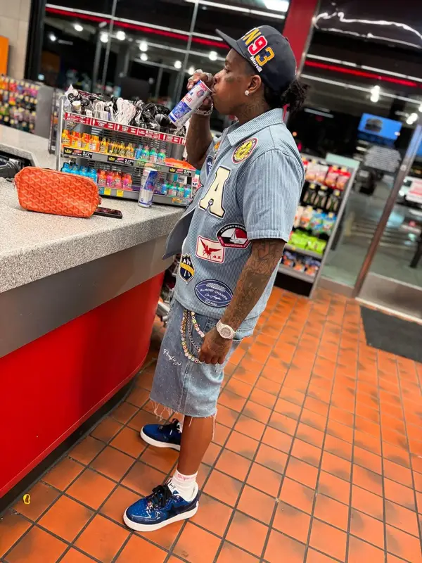 Finesse2tymes outfit in Bape, Supreme, and Hanes, 2025