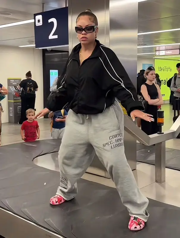 Latto outfit in Jaded London, Bape, and Crocs, 2025