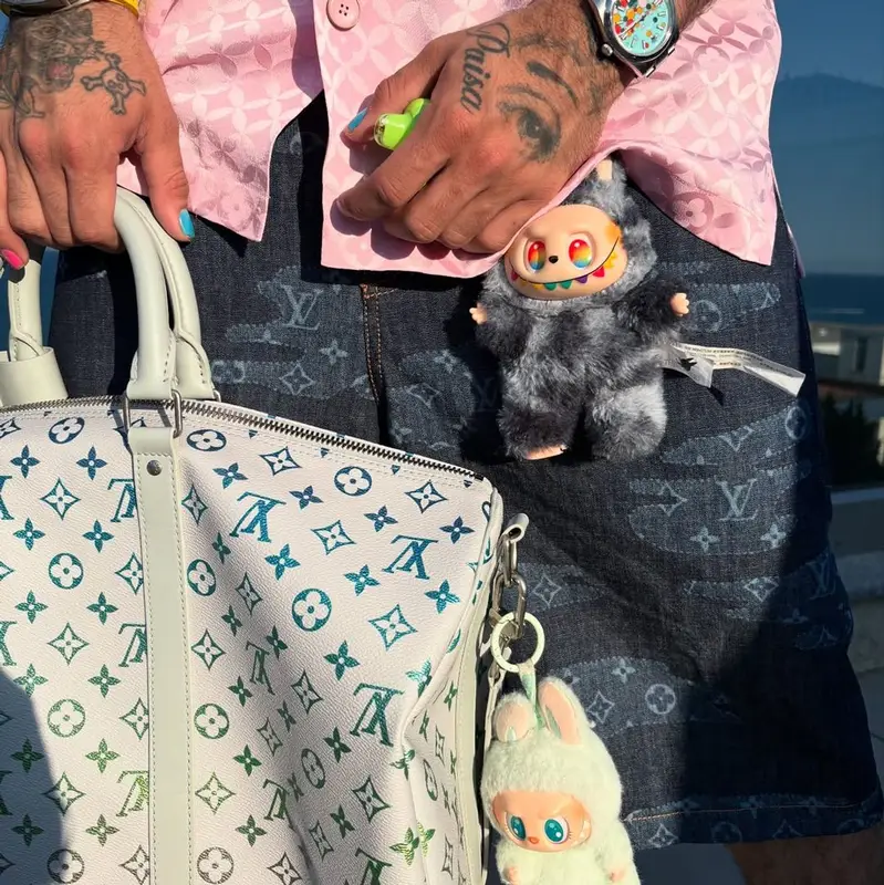 Lil Pump outfit in Louis Vuitton, Prada, and Denim Tears, 2025