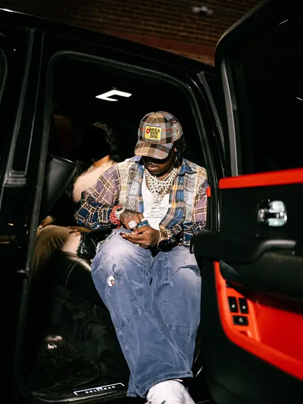 EST Gee outfit in Vale Forever, Nike, and Le Reve Nazam, 2025