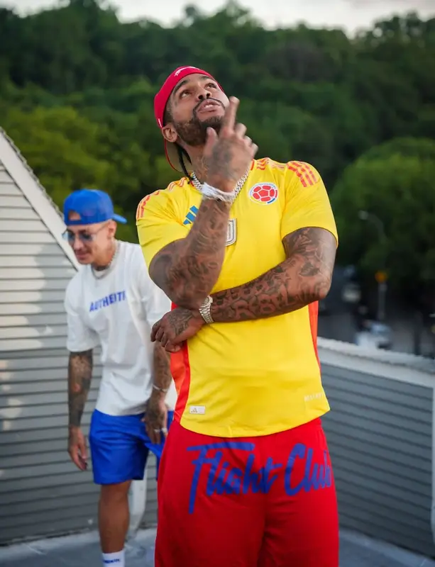 Dave East outfit in Adidas, Champion, and Louis Vuitton, 2025