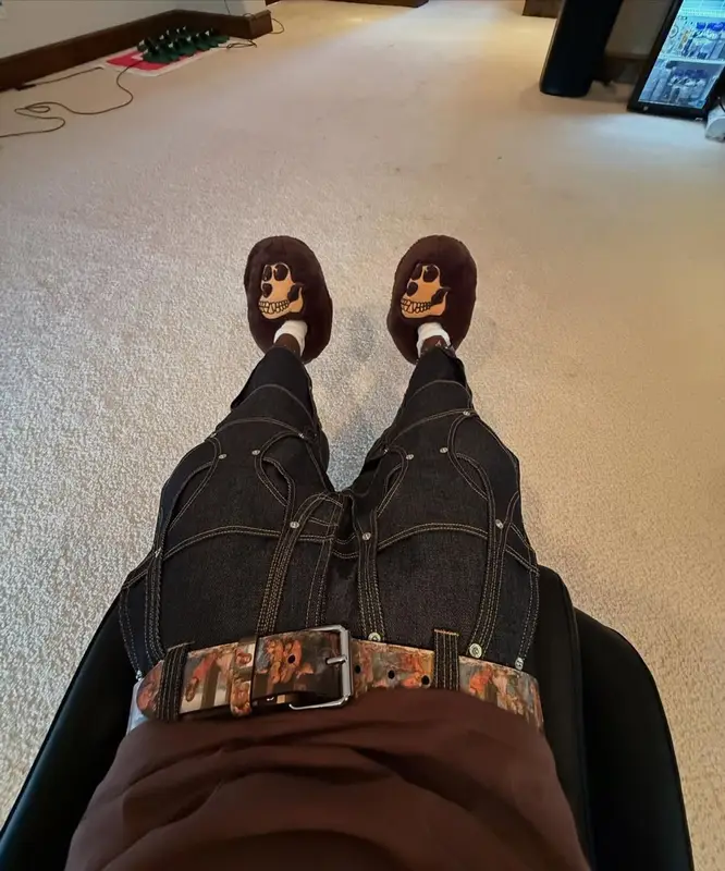 Kai Cenat outfit in Bape, Supreme, and Bored Ape Yacht Club Merch, 2025