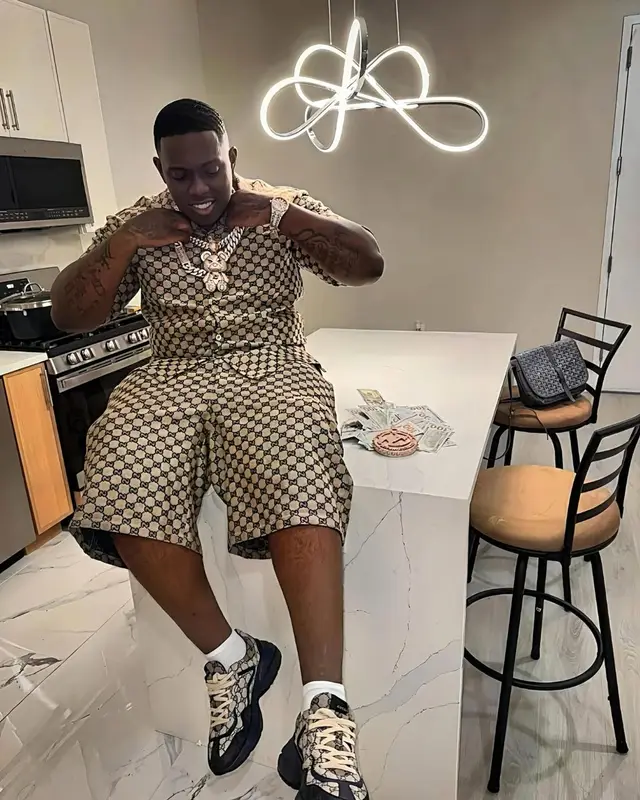 Sheff G outfit in Gucci and Goyard, 2025
