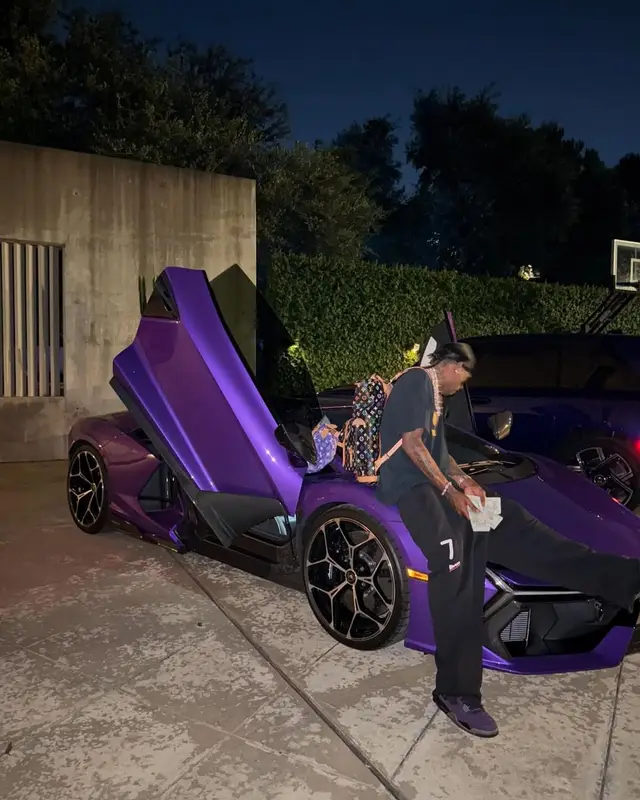Travis Scott outfit in Louis Vuitton, Takashi Murakami, and Calvin Klein, 2025