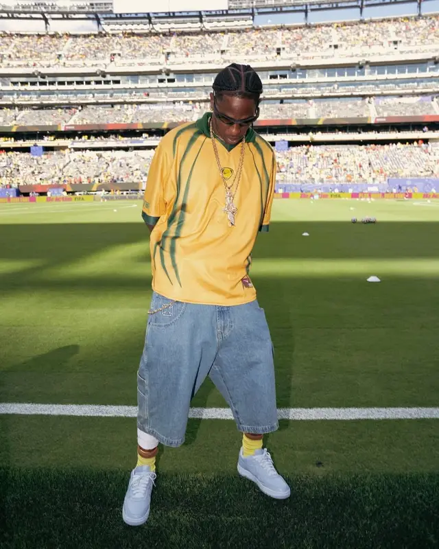 Travis Scott outfit in Nike, Travis Scott Merch, and Oakley, 2026