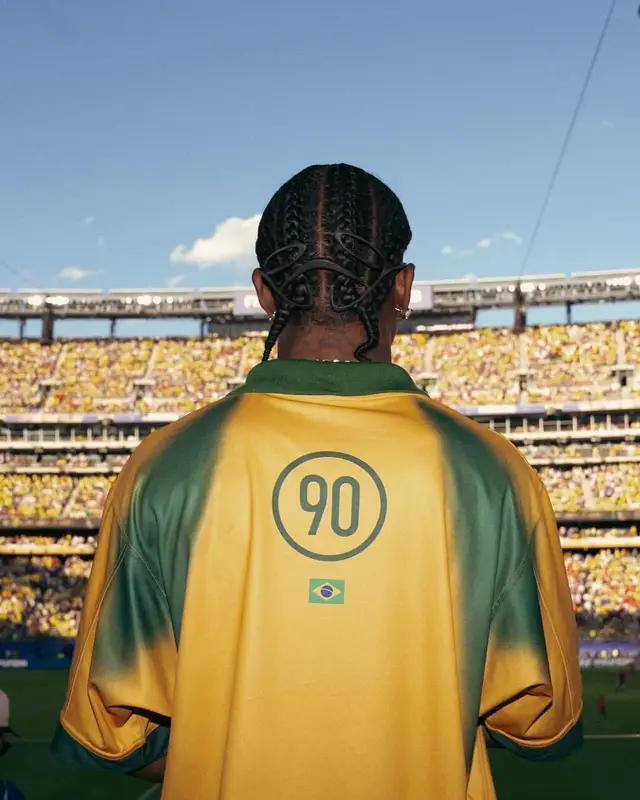 Travis Scott outfit in Nike, Travis Scott Merch, and Oakley, 2026