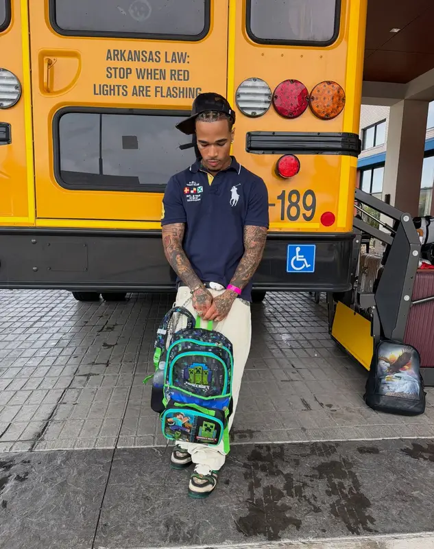 PlaqueBoyMax outfit in Ralph Lauren, Balenciaga, and Gucci, 2026