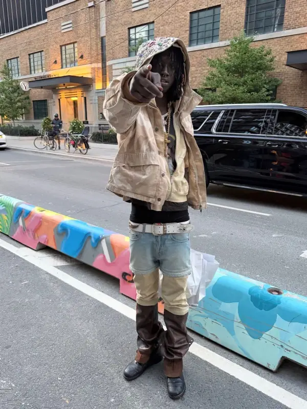 Pz' outfit in Sicko, Mannahatta NYC, and Satoshi Nakamoto, 2026