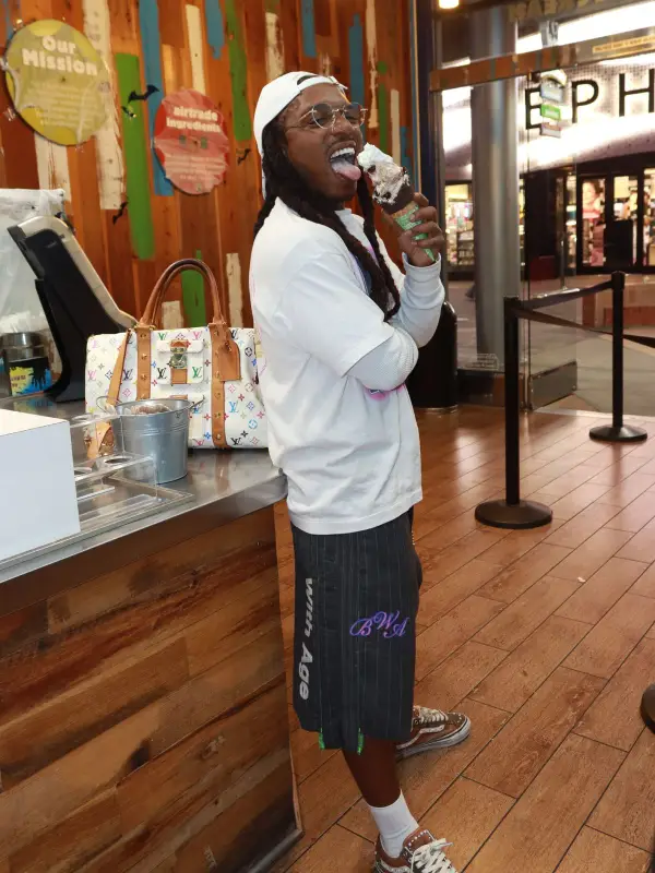 Jacquees outfit in Vans, Louis Vuitton, and Takashi Murakami, 2026
