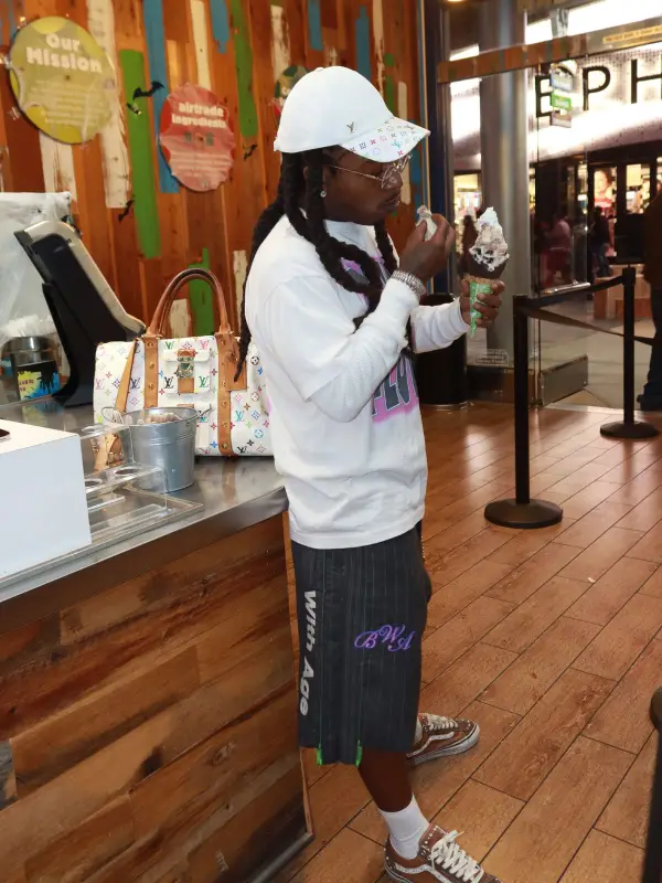 Jacquees outfit in Vans, Louis Vuitton, and Takashi Murakami, 2026