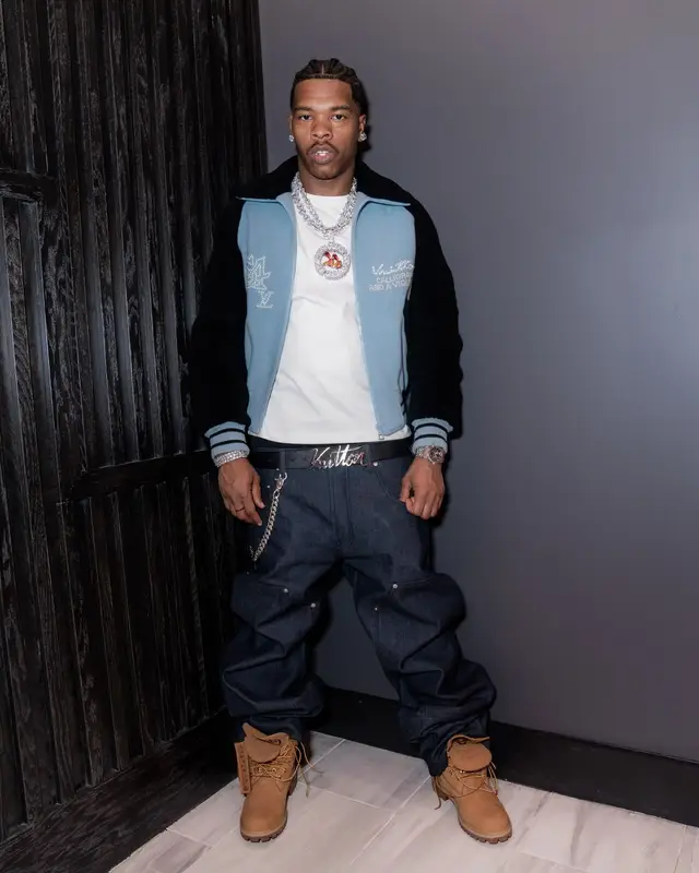 Lil Baby outfit in Timberland, Chrome Hearts, and Louis Vuitton, 2026
