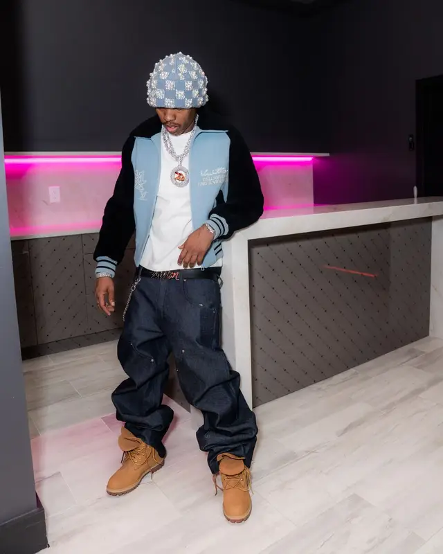 Lil Baby outfit in Timberland, Chrome Hearts, and Louis Vuitton, 2026