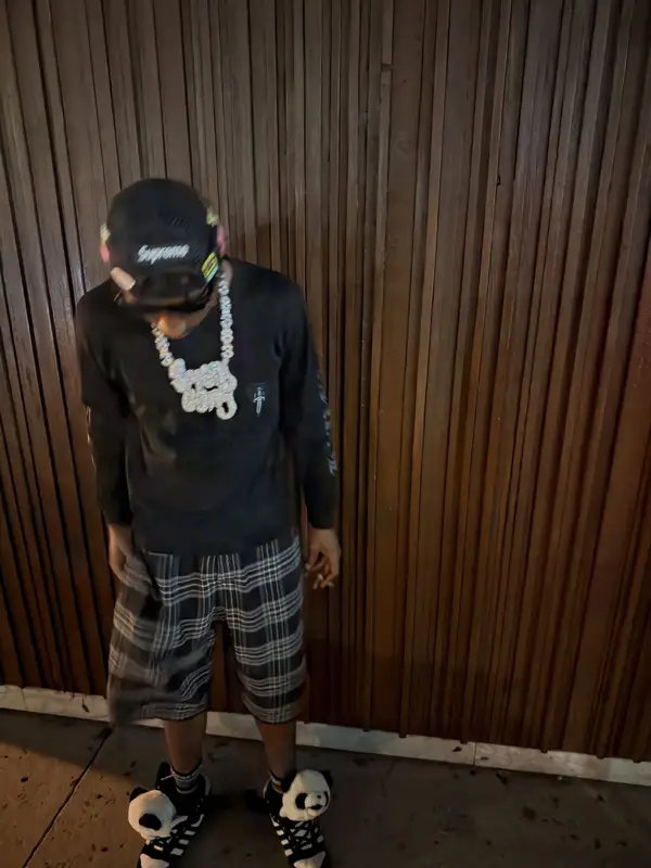 Lil Tjay outfit in Chrome Hearts, Supreme, and Jeff Hamilton, 2026