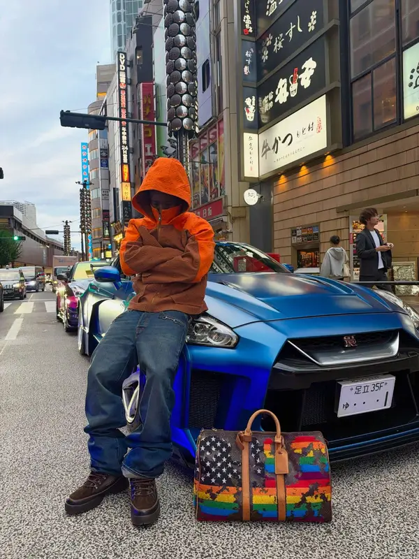Kai Cenat outfit in Louis Vuitton, Gucci, and Vintage, 2026