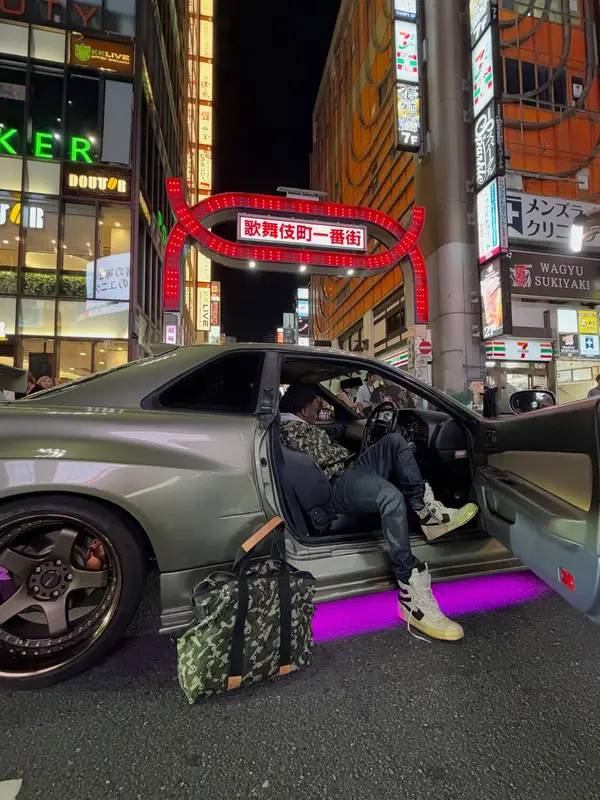 Kai Cenat outfit in Louis Vuitton, Rick Owens, and Takashi Murakami, 2026