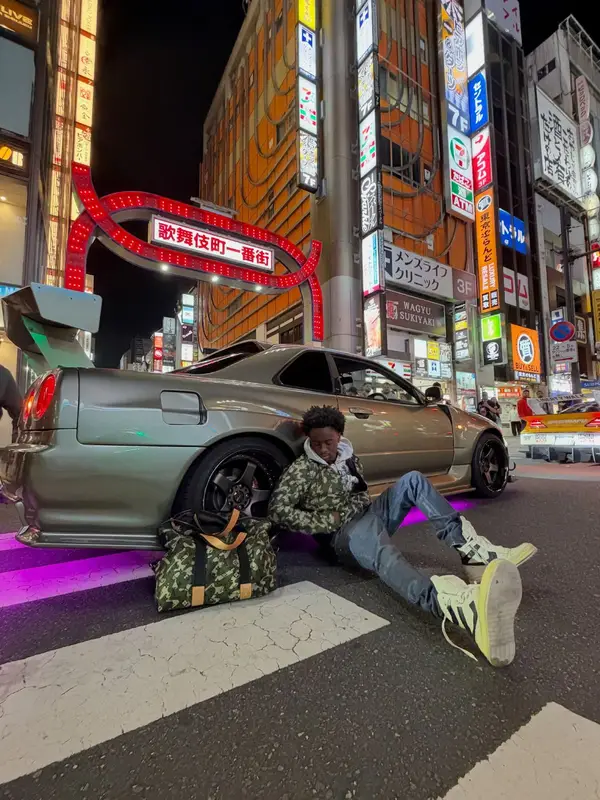 Kai Cenat outfit in Louis Vuitton, Rick Owens, and Takashi Murakami, 2026