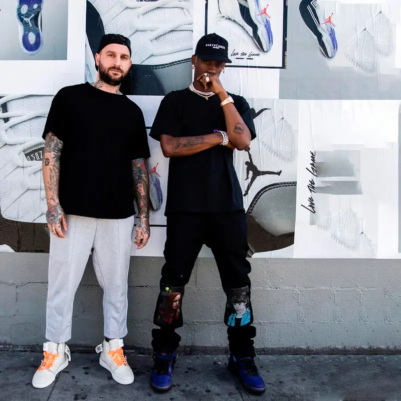 Travis Scott outfit in Travis Scott Merch, Raf Simons, and Cactus Jack, 2018
