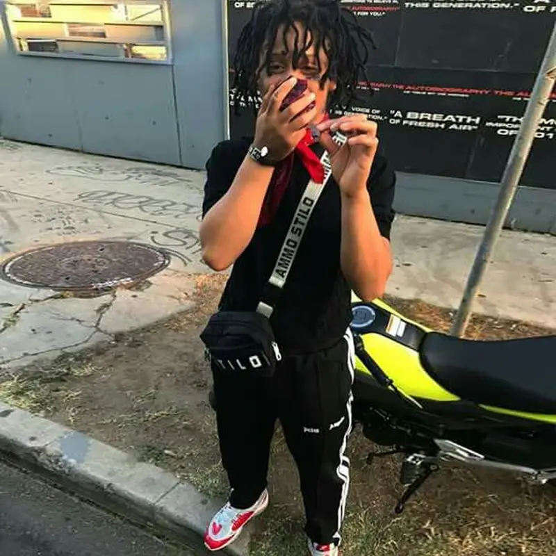 Trippie Redd outfit in Vlone, Bape, and Samson, 2018