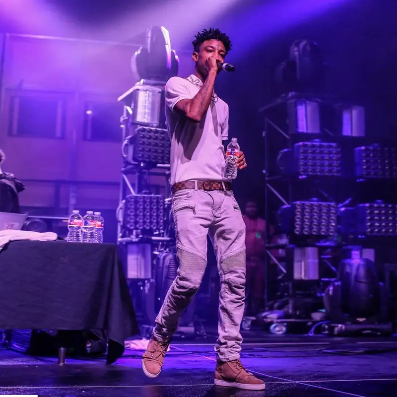 21 Savage outfit in Gucci, Balmain, and Louis Vuitton, 2018