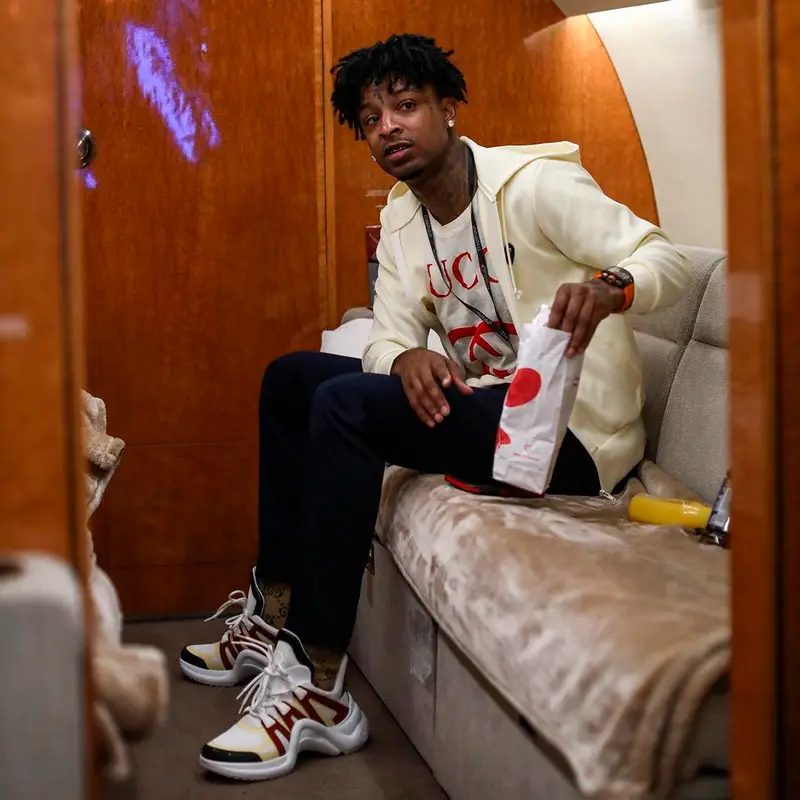 21 Savage outfit in Comme Des Garcons, Gucci, and Louis Vuitton, 2019