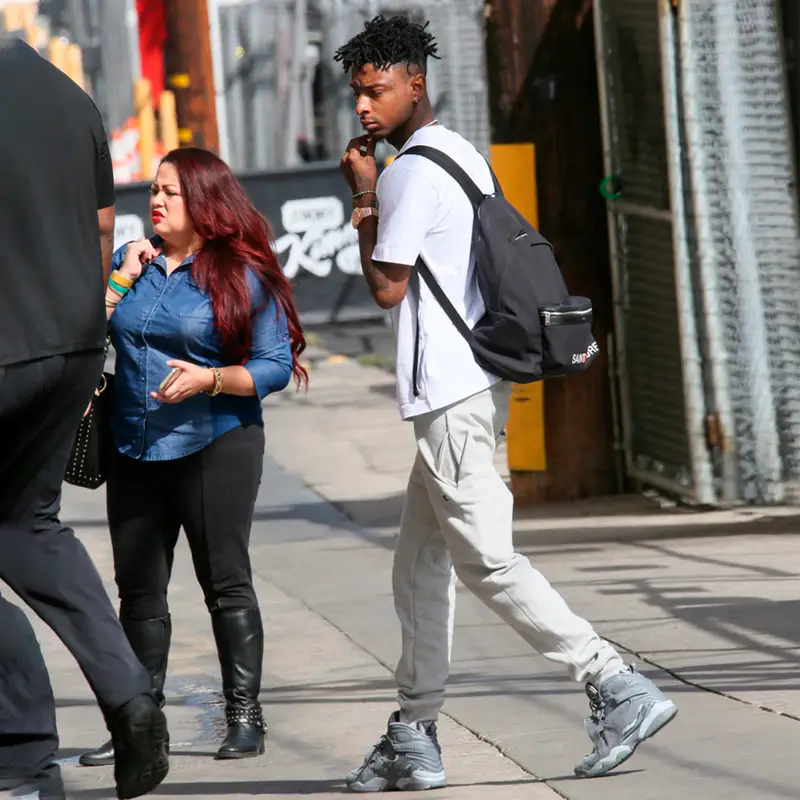 21 Savage outfit in Palm Angels, Champion, and Saint Laurent, 2018