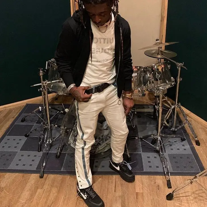 Lil Uzi Vert outfit in Louis Vuitton, Off-White, and Nike, 2019